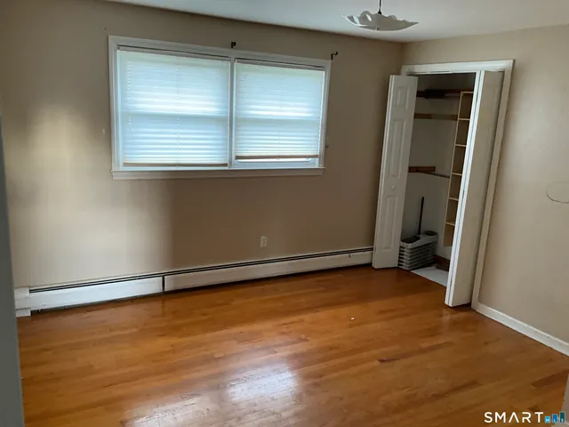 an empty room with window