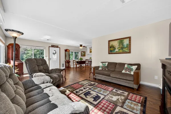 a living room with furniture and a couch
