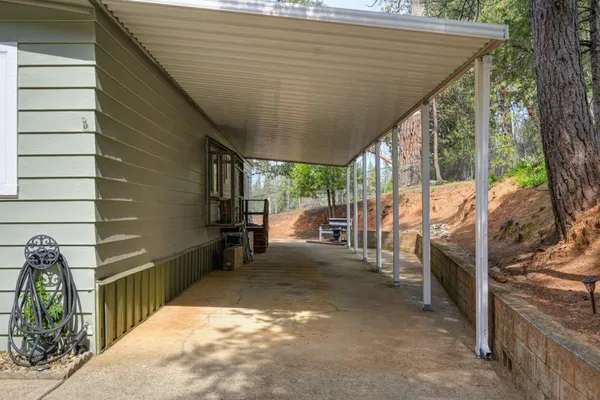 a view of a porch with furniture