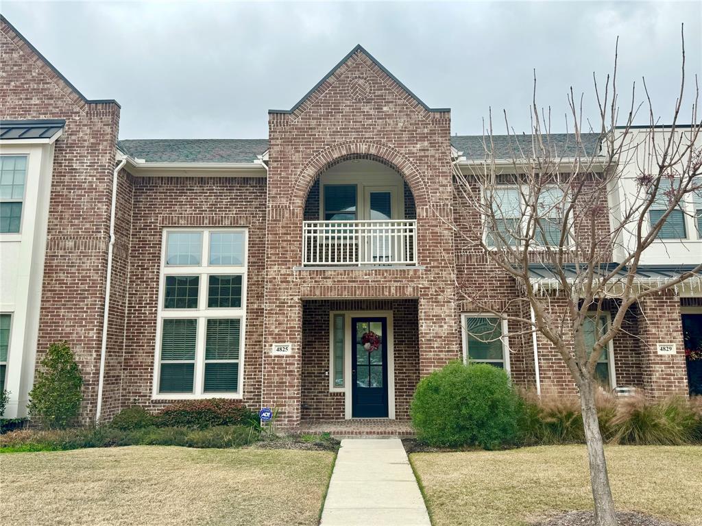 4825 Paddock Trail Carrollton, TX 75010 - Photo 1 of 1 a front view of a house with a yard