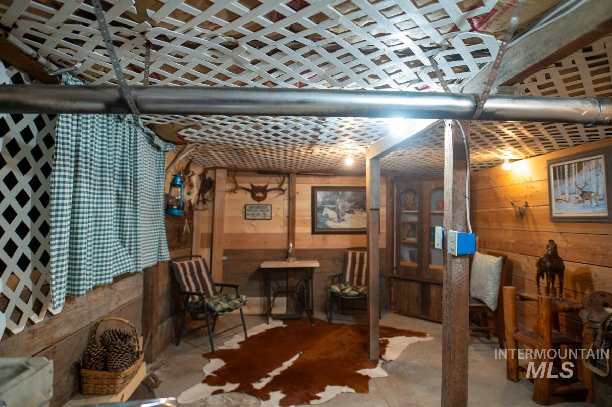 733 Pringle Road Weiser, ID 83672 - Photo 20 of 46 Unfinished below grade area with wooden walls