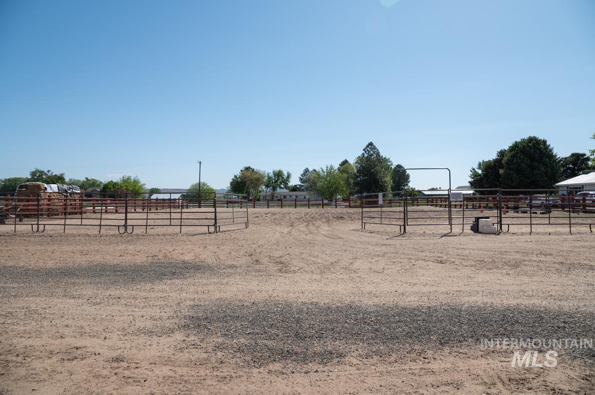 733 Pringle Road Weiser, ID 83672 - Photo 37 of 46 View of yard with a view of countryside and an outdoor riding arena