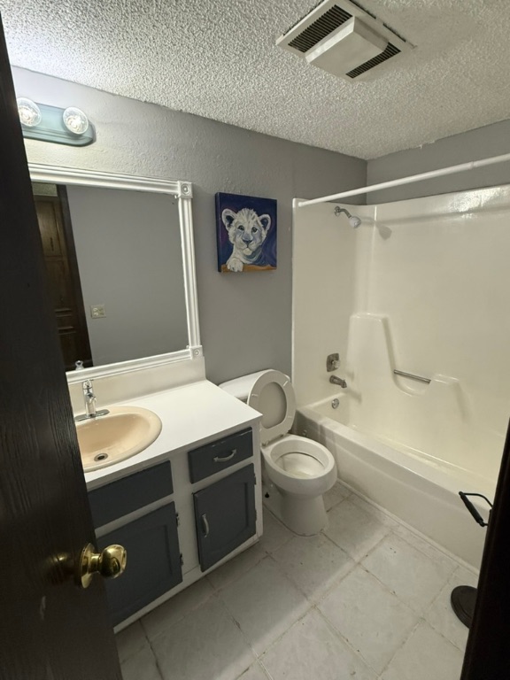 907 East Meadowmere Lane Austin, TX 78758 - Photo 17 of 23 a bathroom with a toilet sink and mirror