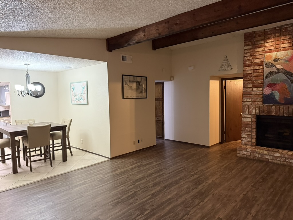 907 East Meadowmere Lane Austin, TX 78758 - Photo 5 of 23 a view of a livingroom with furniture and wooden floor