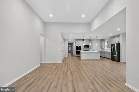 a view of kitchen with wooden floor