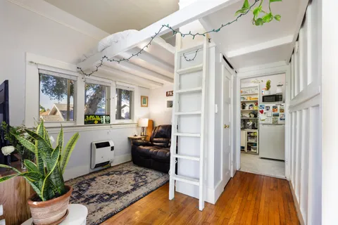 a view of living room and kitchen