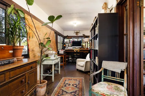 a room with furniture and a chandelier