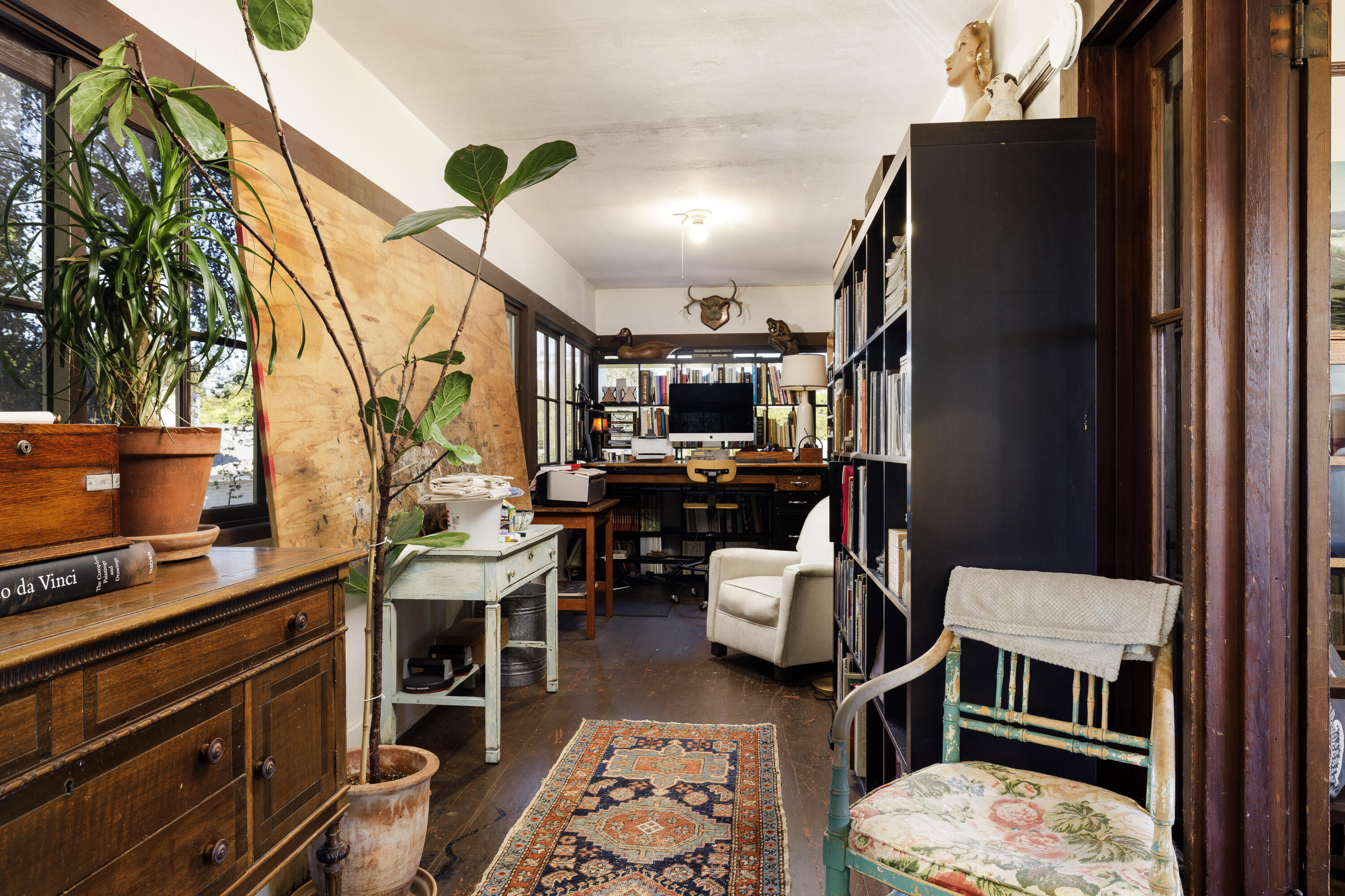 1403 Bath Street Santa Barbara, CA 93101 - Photo 19 of 24 a room with furniture and a chandelier