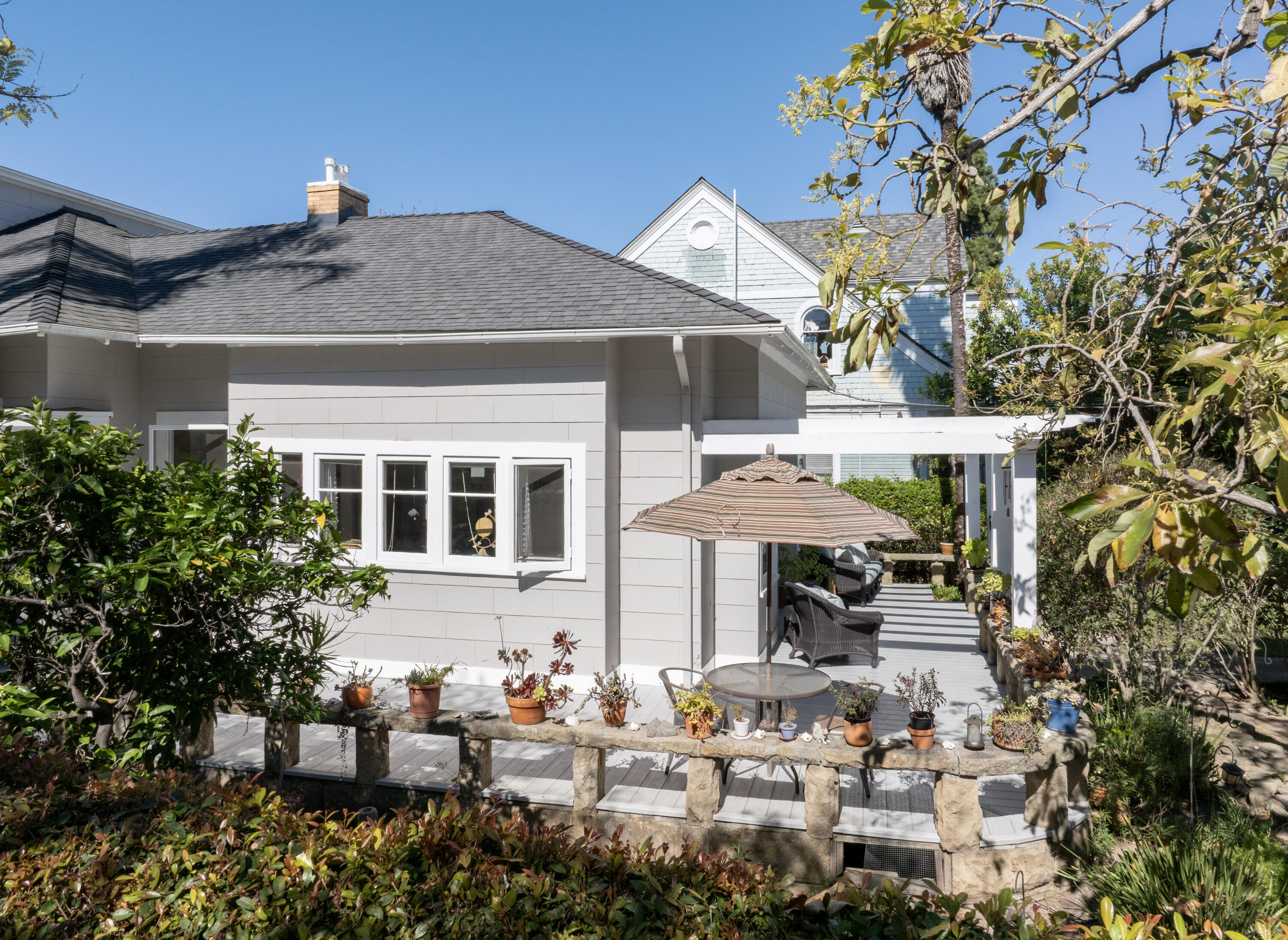 1403 Bath Street Santa Barbara, CA 93101 - Photo 4 of 24 a front view of a house with patio