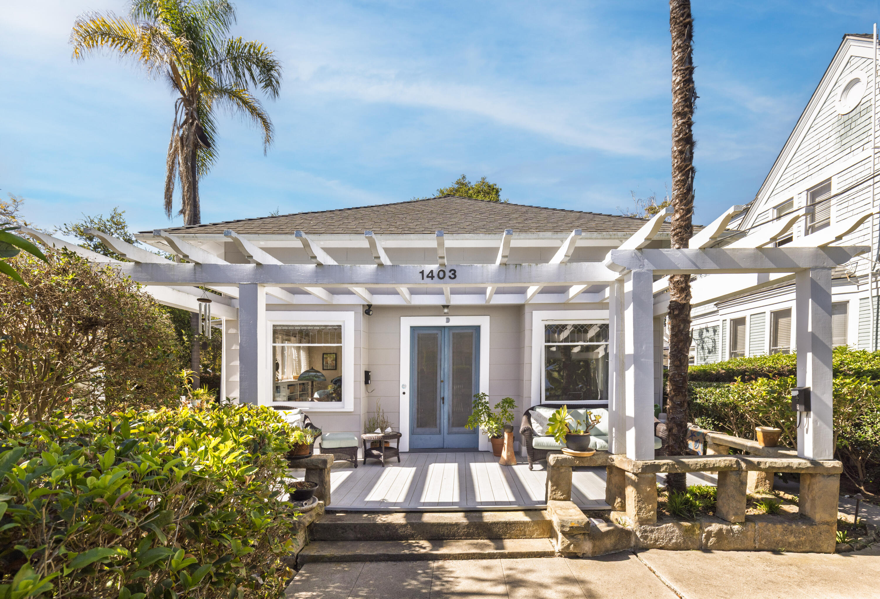 1403 Bath Street Santa Barbara, CA 93101 - Photo 5 of 24 a front view of a building with outdoor seating