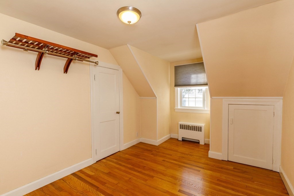 46 Bickford Hill Road Gardner, MA 01440 - Photo 11 of 19 a view of a room with wooden staircase and a ceiling fan