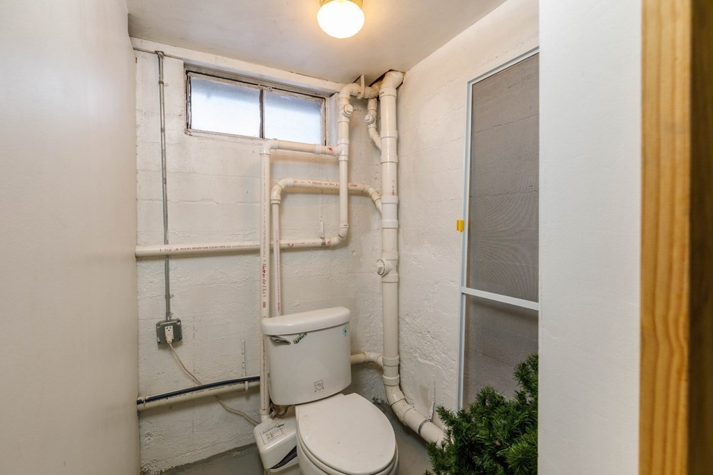 46 Bickford Hill Road Gardner, MA 01440 - Photo 14 of 19 a white toilet sitting next to a shower