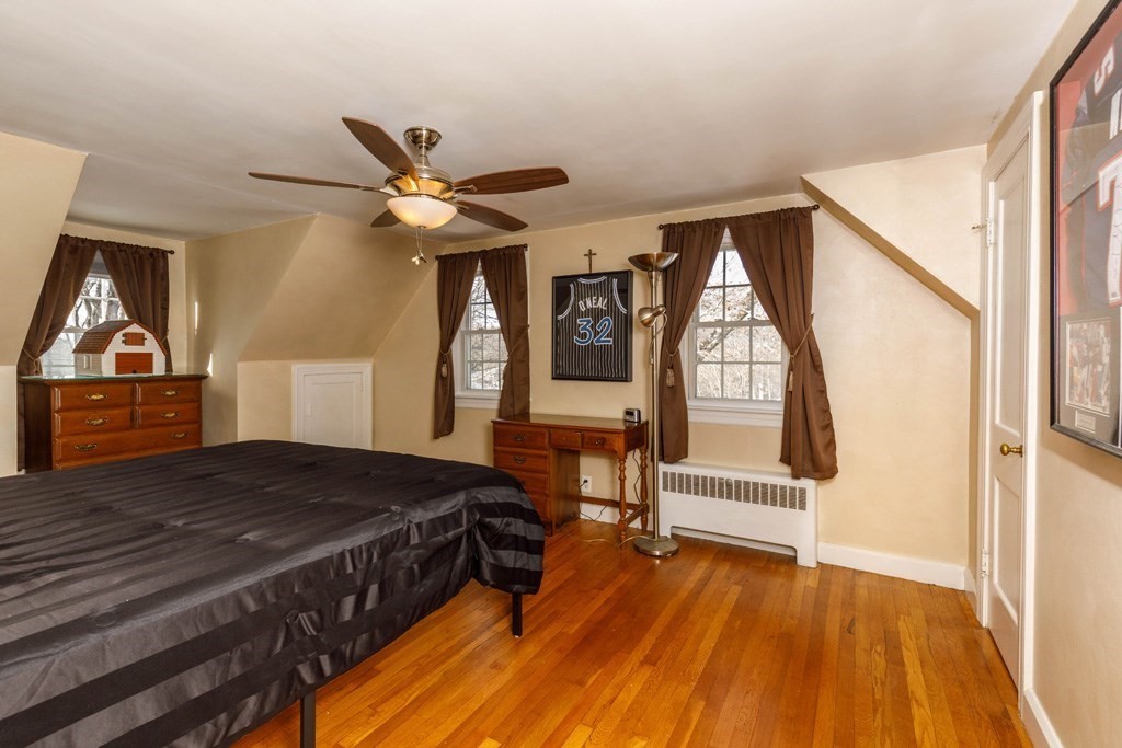 46 Bickford Hill Road Gardner, MA 01440 - Photo 8 of 19 a bedroom with a bed and a large window