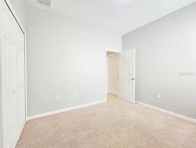 an empty room with an entryway