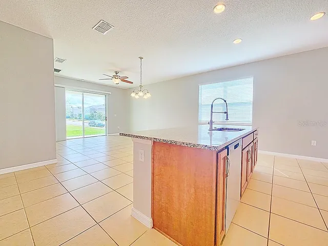a bathroom with a double vanity sink and mirror
