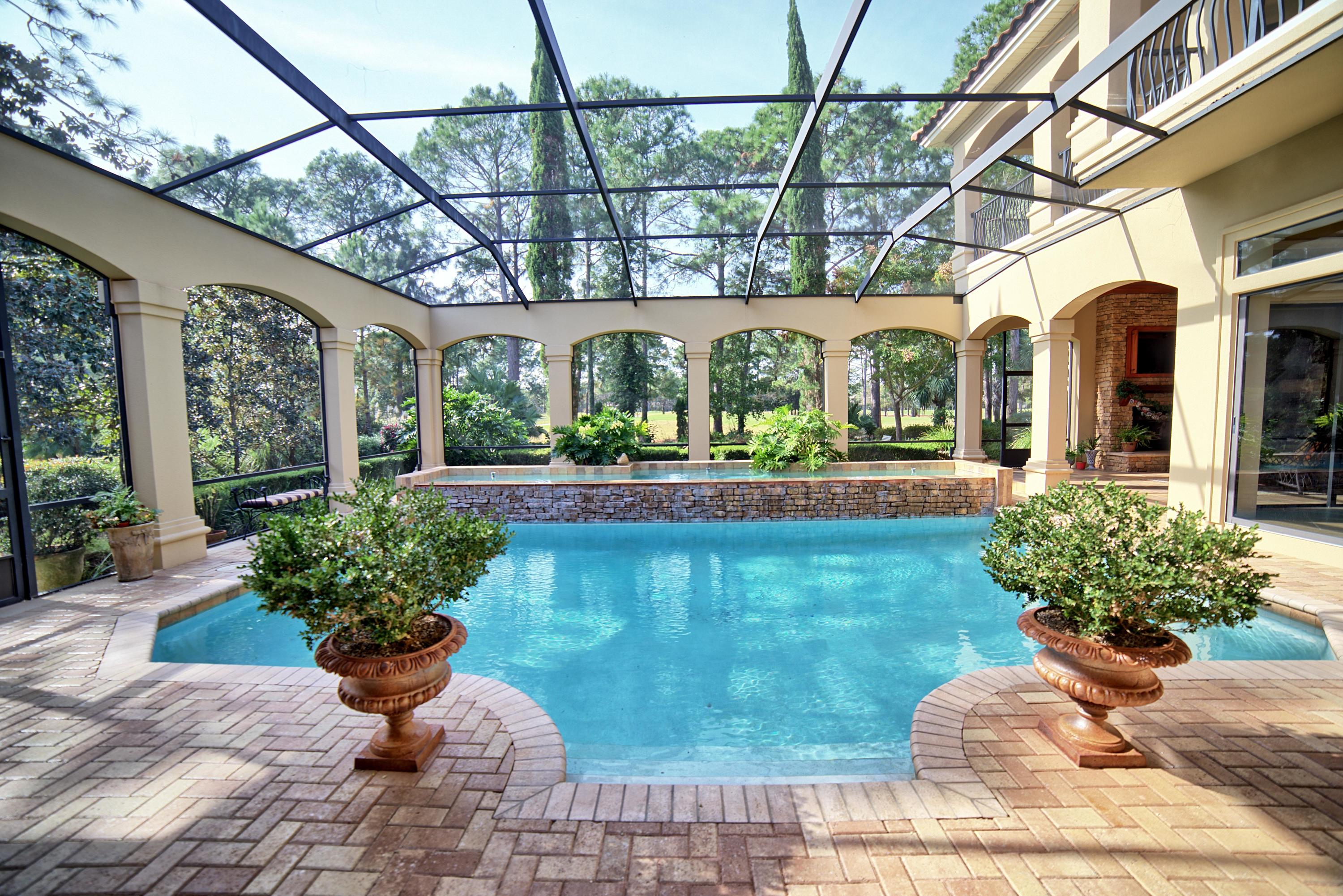 3594 Preserve Lane Miramar Beach, FL 32550 - Photo 2 of 35 a view of a building with a garden