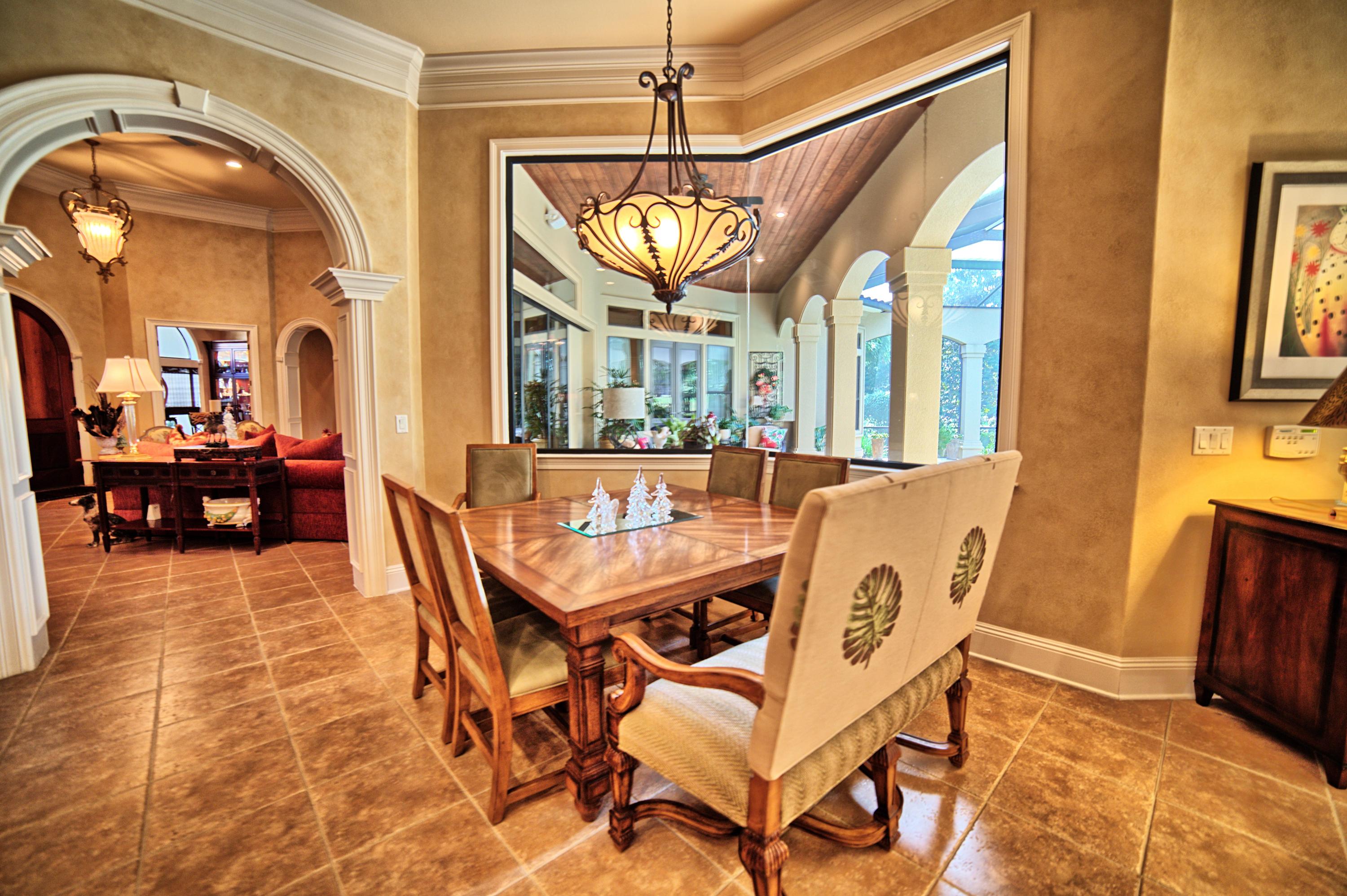 3594 Preserve Lane Miramar Beach, FL 32550 - Photo 11 of 35 a view of a dining room with furniture front door and a chandelier
