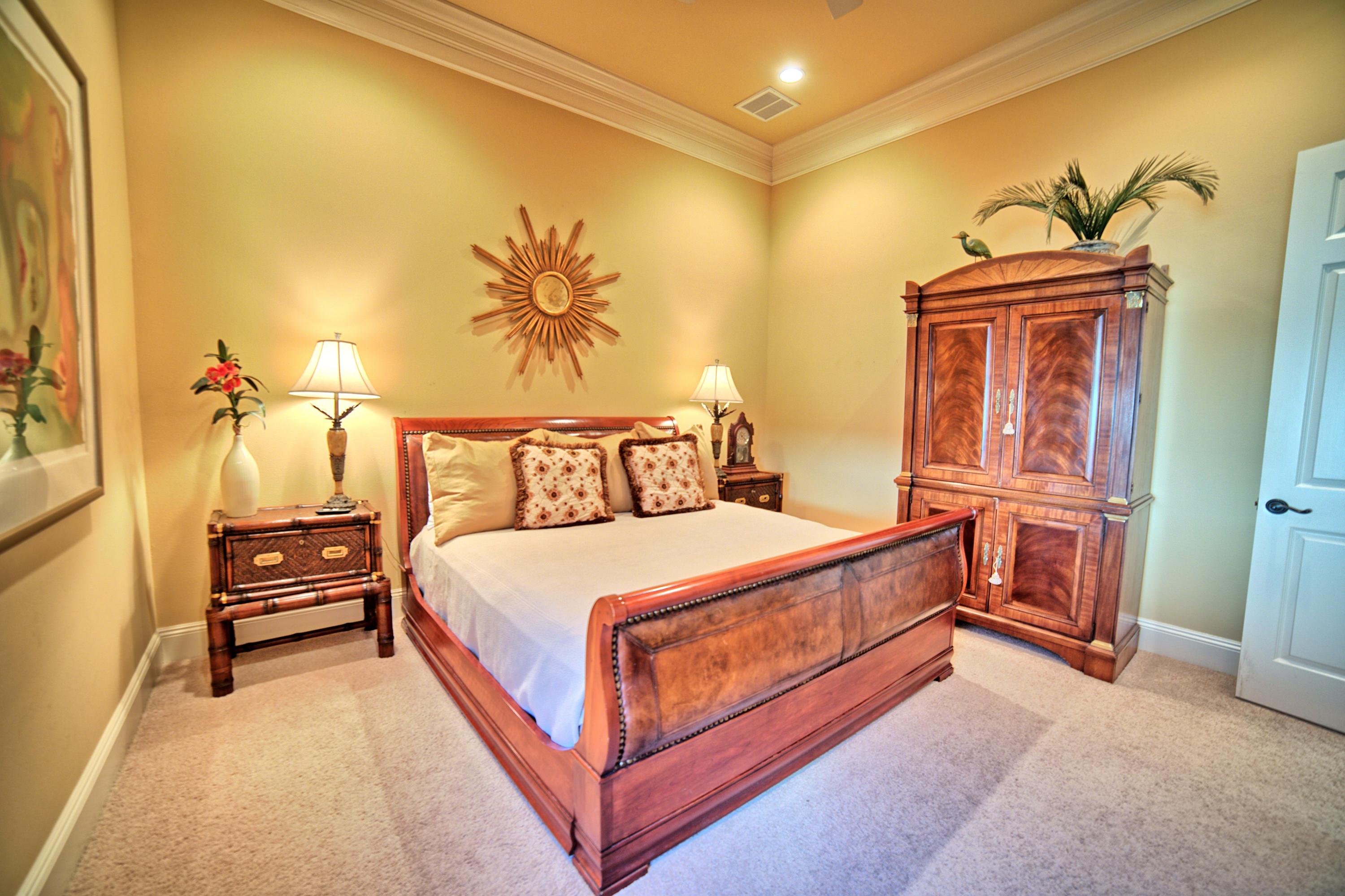 3594 Preserve Lane Miramar Beach, FL 32550 - Photo 22 of 35 a bedroom with a bed and wooden floor