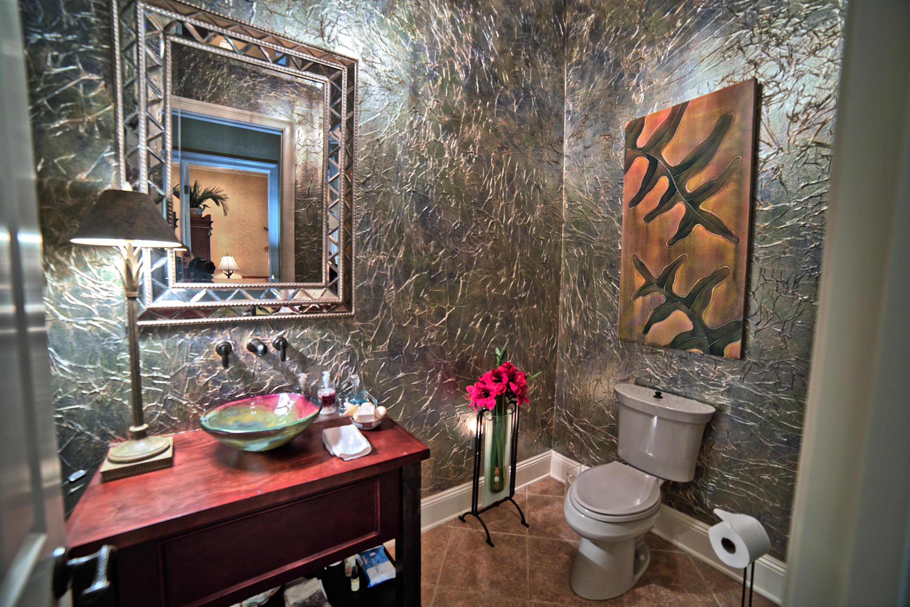 3594 Preserve Lane Miramar Beach, FL 32550 - Photo 24 of 35 a bathroom with a toilet sink and mirror