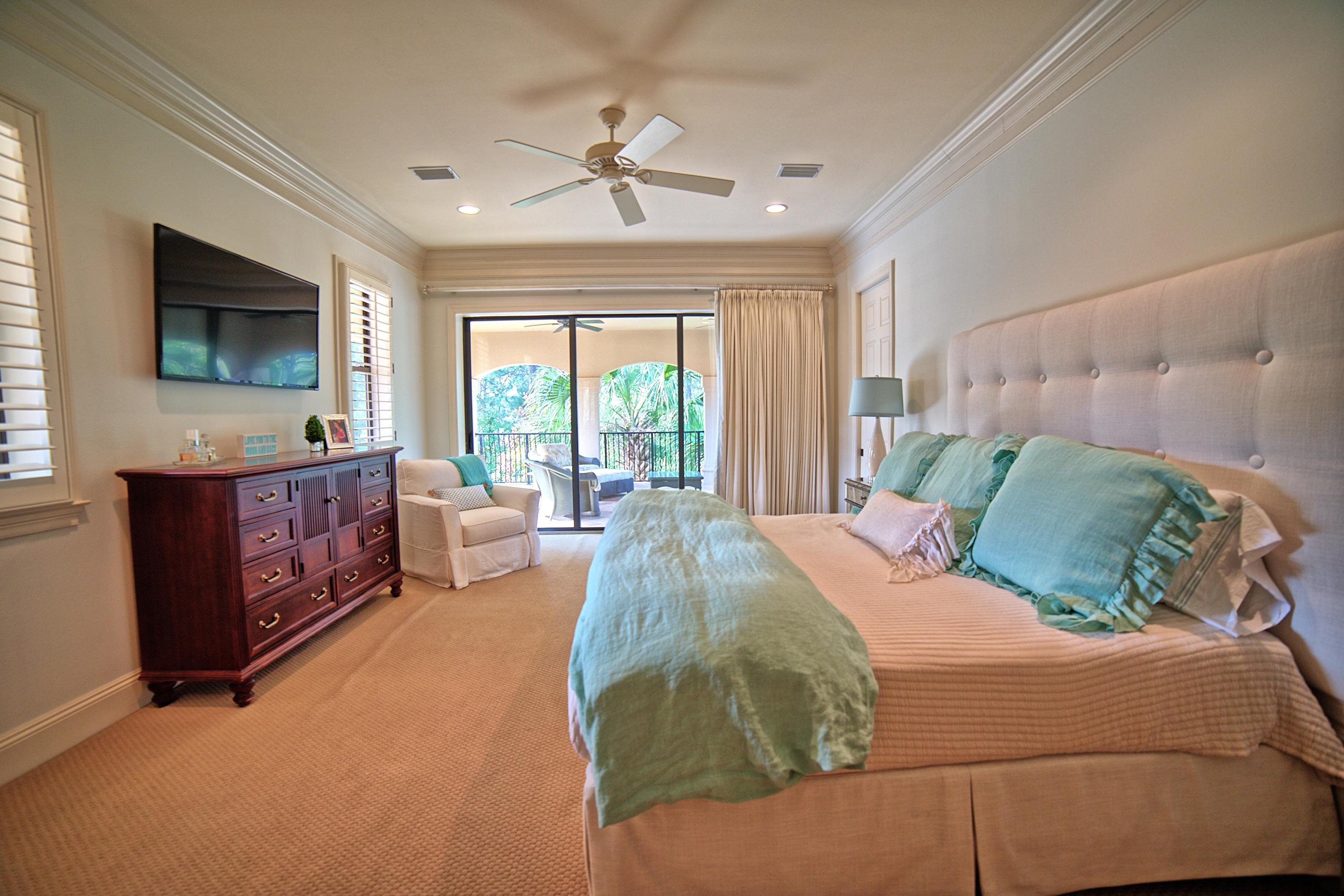 3594 Preserve Lane Miramar Beach, FL 32550 - Photo 26 of 35 a bed room with a bed and a television