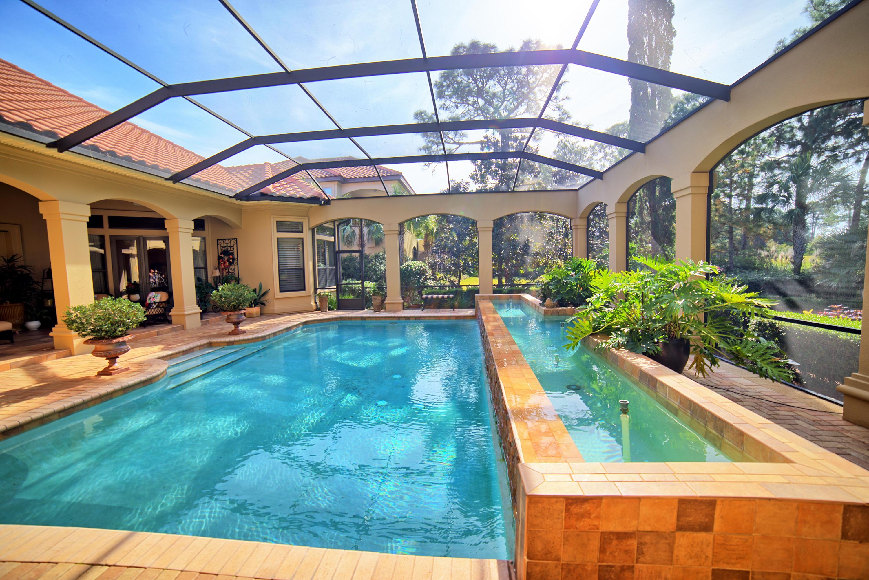 3594 Preserve Lane Miramar Beach, FL 32550 - Photo 32 of 35 a view of a swimming pool with potted plants