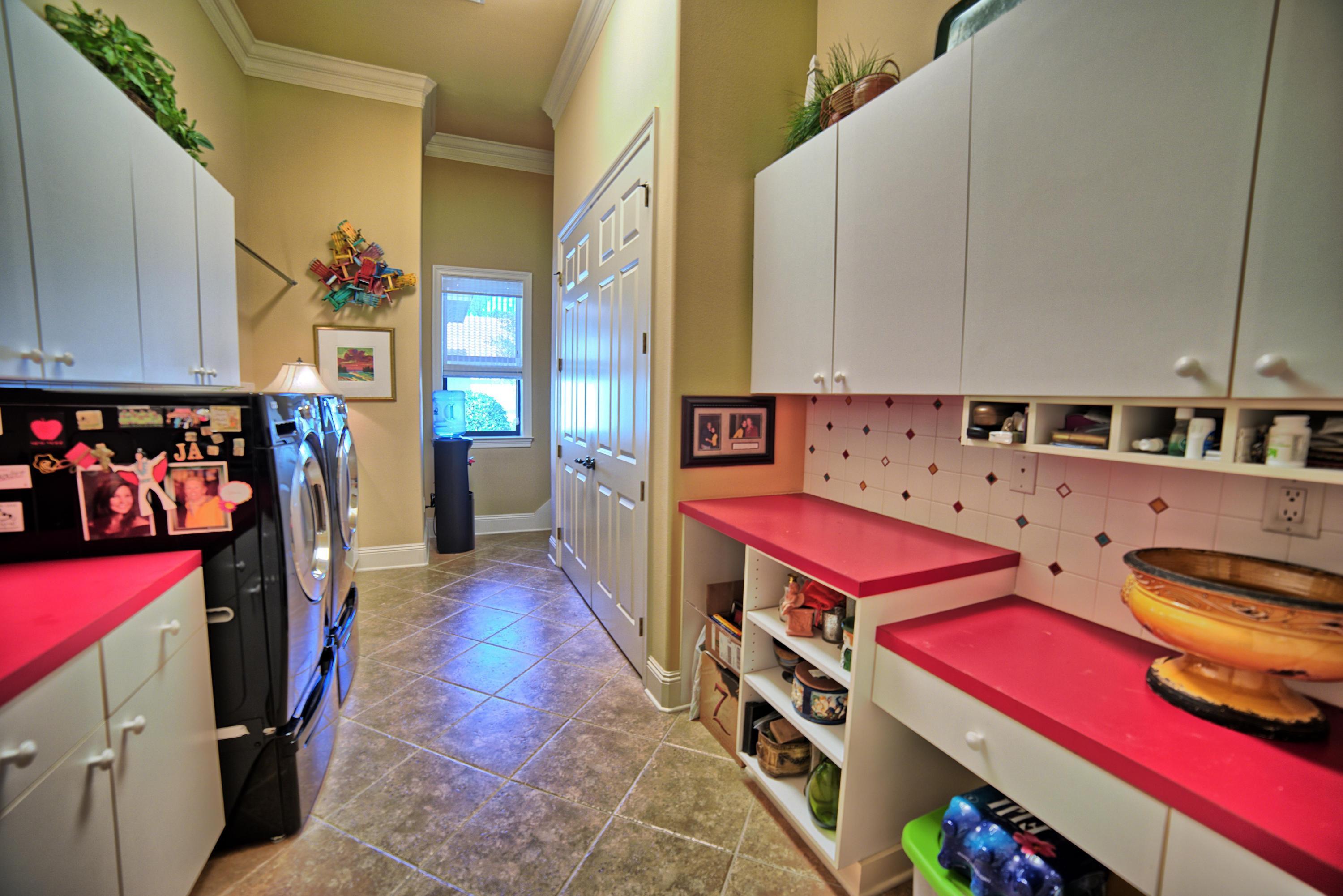 3594 Preserve Lane Miramar Beach, FL 32550 - Photo 34 of 35 a utility room with dryer and washer