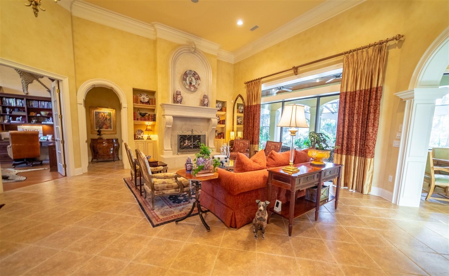 3594 Preserve Lane Miramar Beach, FL 32550 - Photo 5 of 35 a living room with fireplace furniture and a window