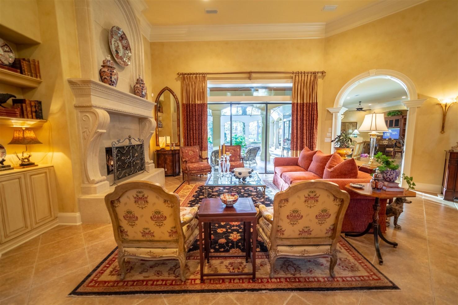3594 Preserve Lane Miramar Beach, FL 32550 - Photo 6 of 35 a living room with fireplace furniture and a fireplace
