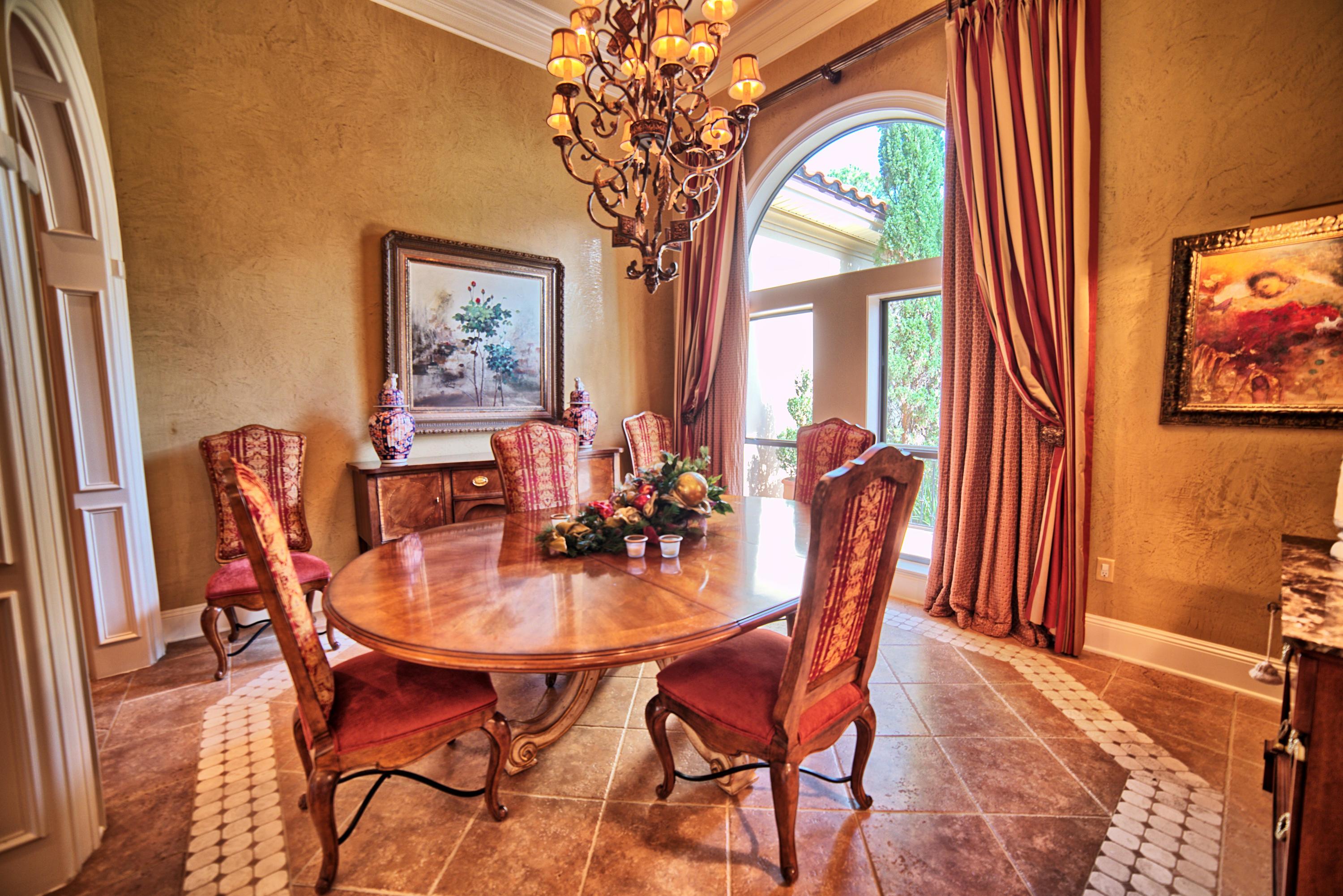 3594 Preserve Lane Miramar Beach, FL 32550 - Photo 9 of 35 a dining room with furniture a rug and a chandelier