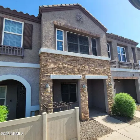 a front view of a house with yard