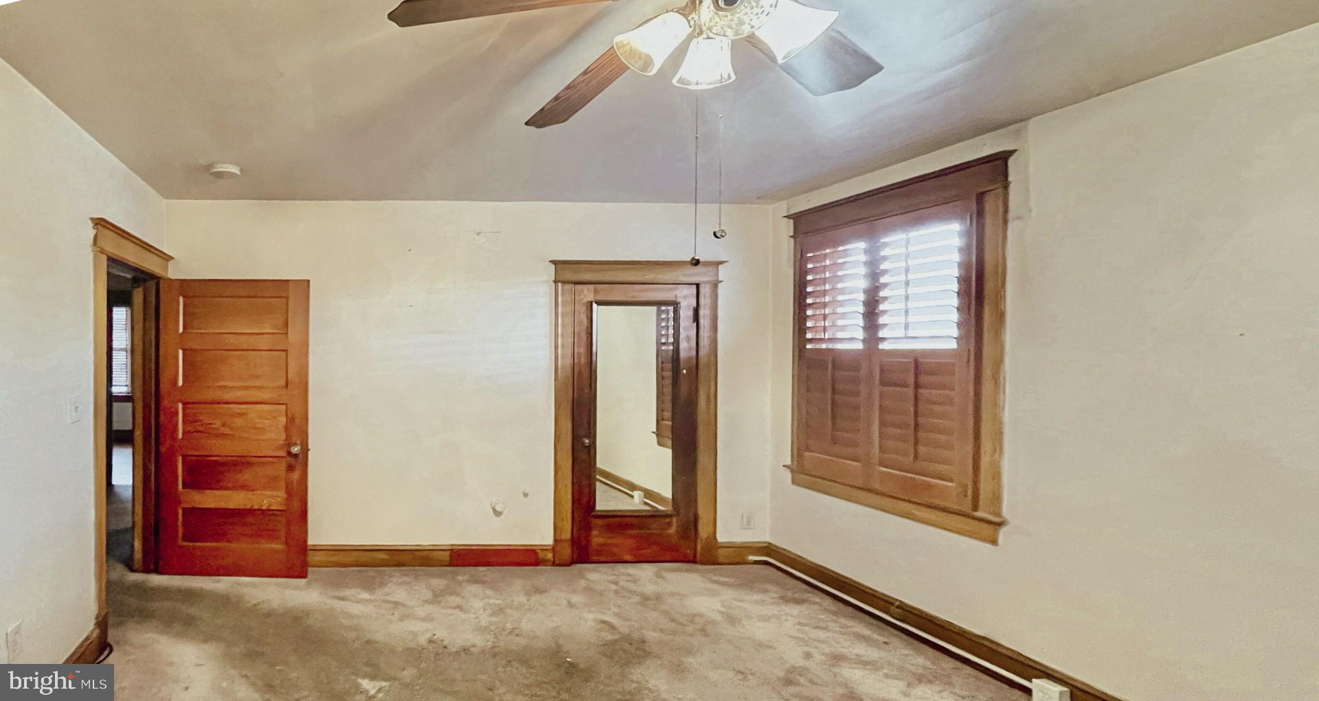 121 Raleigh Street Southeast Washington, DC 20032 - Photo 17 of 21 an empty room with windows