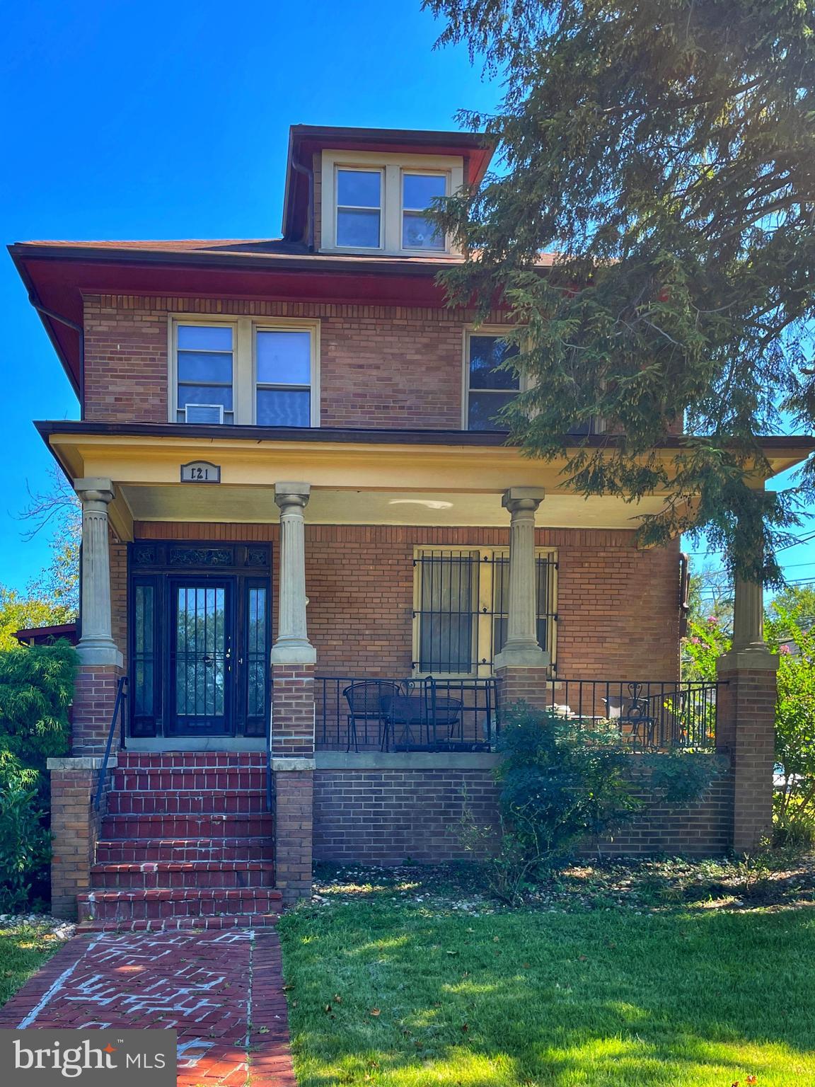 121 Raleigh Street Southeast Washington, DC 20032 - Photo 2 of 21 front view of a house with a yard