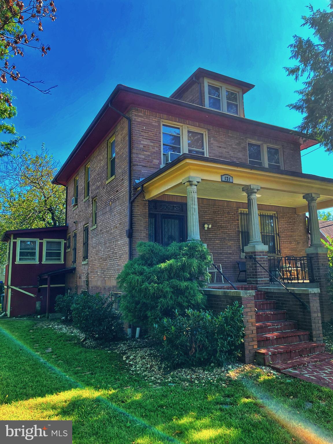 121 Raleigh Street Southeast Washington, DC 20032 - Photo 3 of 21 a front view of a house with garden