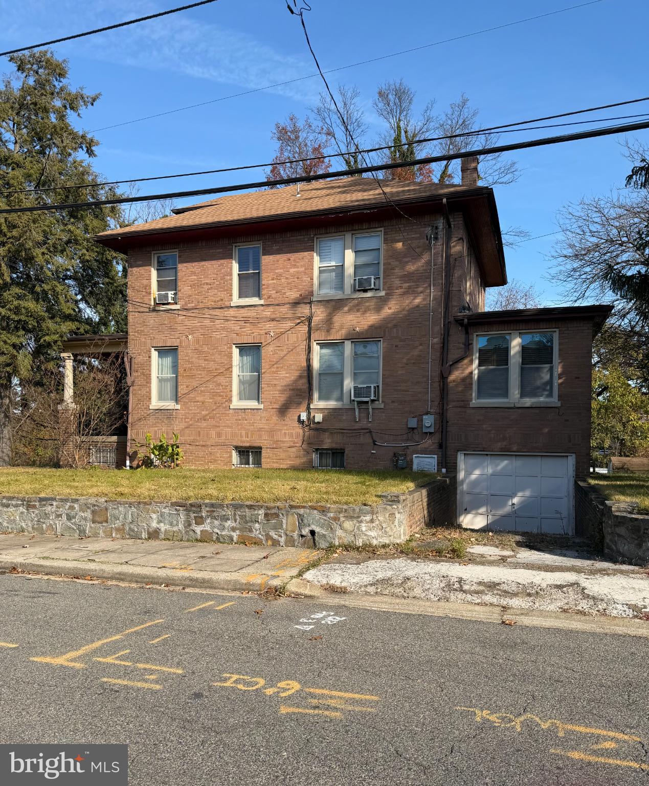 121 Raleigh Street Southeast Washington, DC 20032 - Photo 5 of 21 a front view of a house with a yard