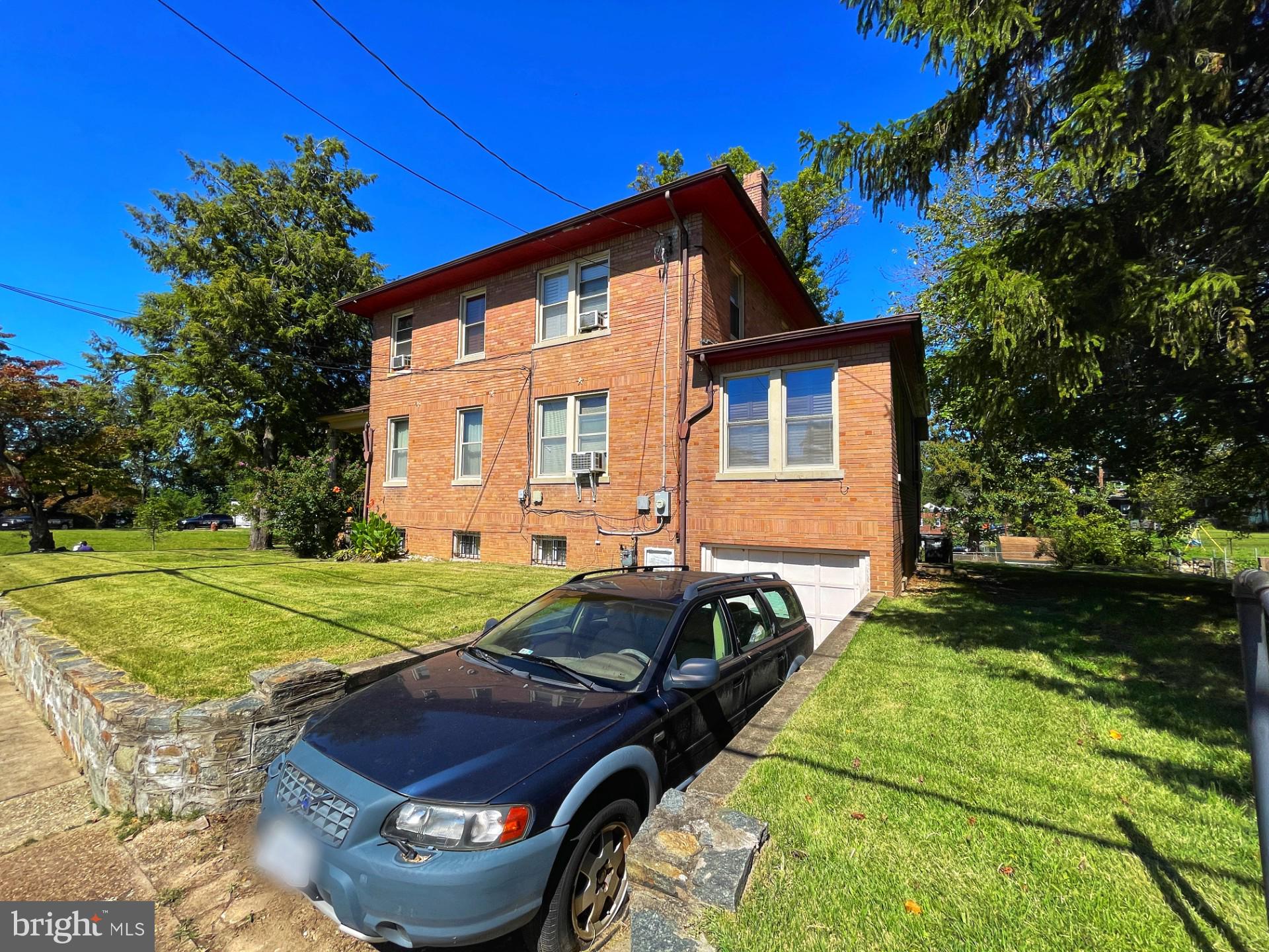 121 Raleigh Street Southeast Washington, DC 20032 - Photo 6 of 21 a front view of a house with garden