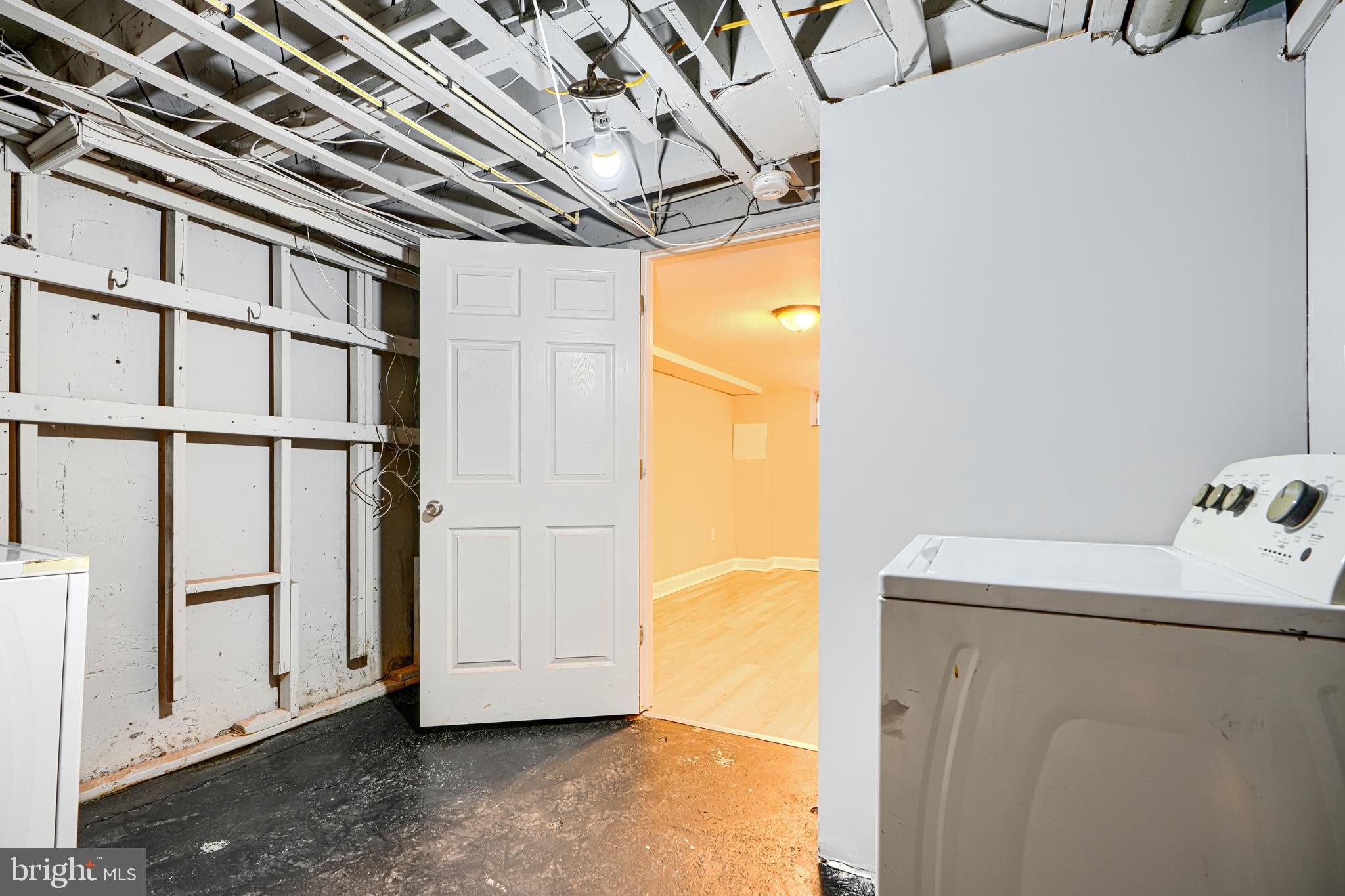 165 Hampshire Road Essex, MD 21221 - Photo 31 of 40 a utility room with dryer and washer