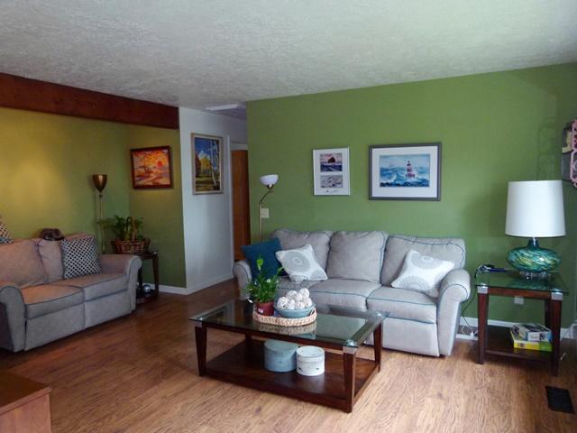 503 Hodgdon Road Tillamook, OR 97141 - Photo 31 of 43 a living room with furniture and a wooden floor