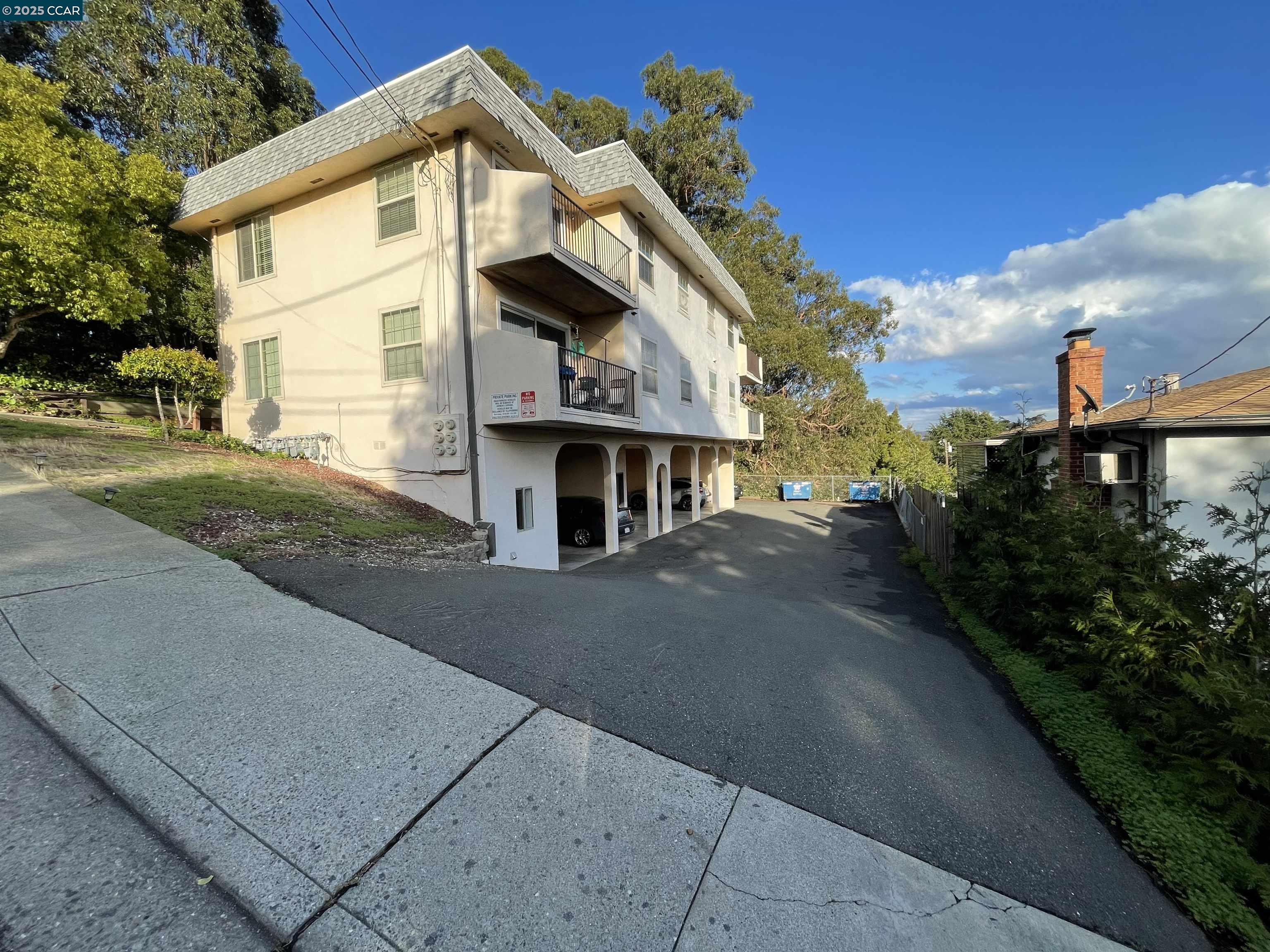 a view of a house with a street
