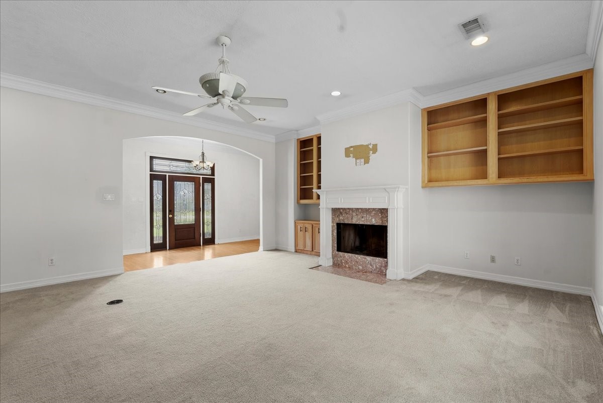 1607 Delta Lane Baytown, TX 77523 - Photo 12 of 48 Another view of the living room looking back towards the front door.