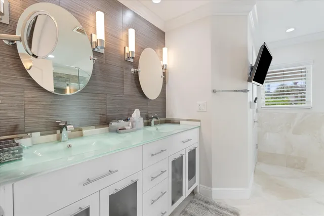 $3,925,000 | 830 Northeast Boca Bay Colony Drive, Boca Raton, FL 33487