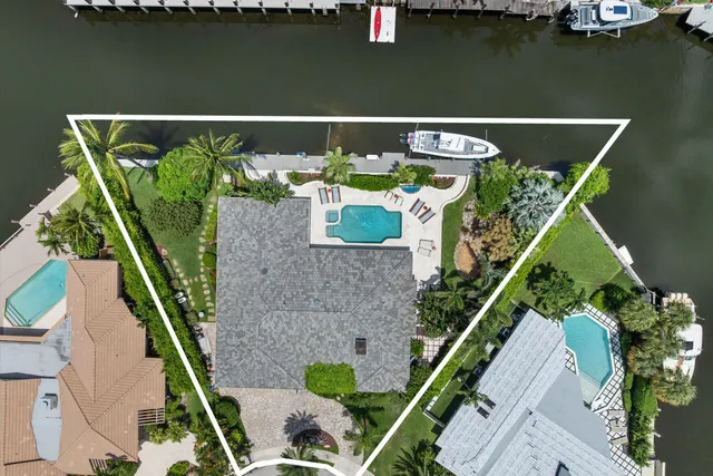 $3,925,000 | 830 Northeast Boca Bay Colony Drive, Boca Raton, FL 33487