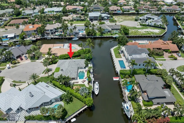 $3,925,000 | 830 Northeast Boca Bay Colony Drive, Boca Raton, FL 33487