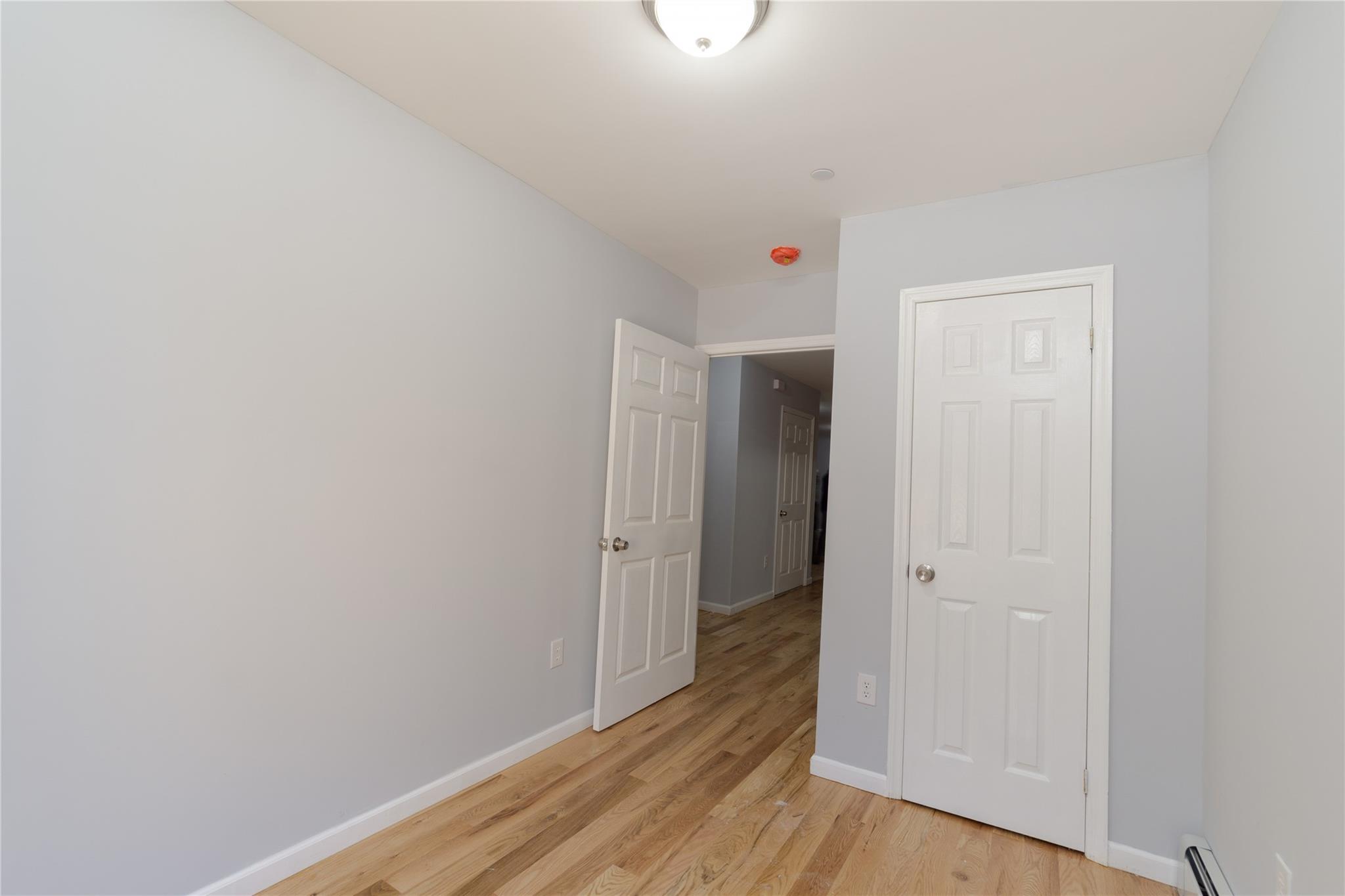 1102 Jackson Avenue Bronx, NY 10456 - Photo 33 of 36 a view of an empty room