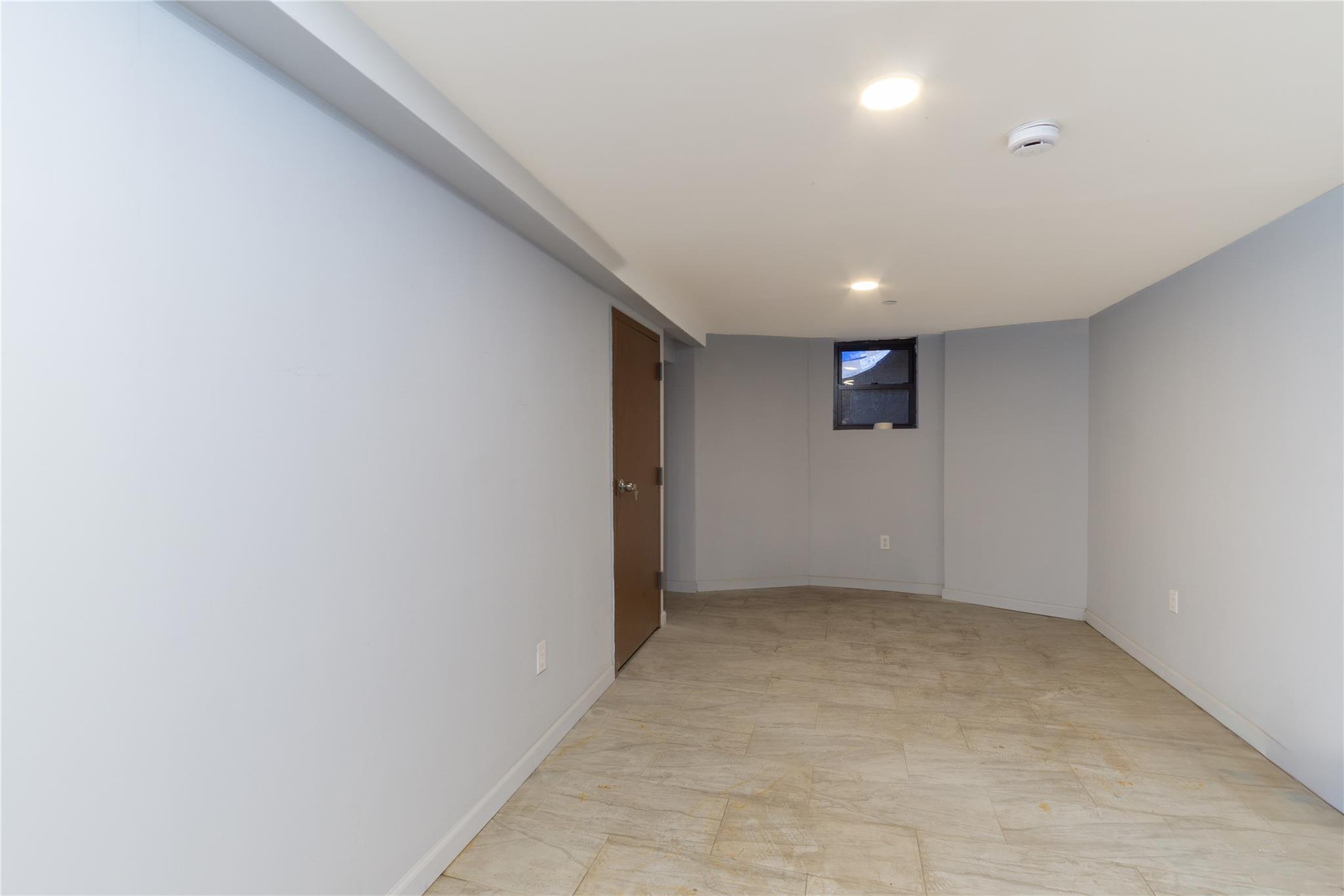 1102 Jackson Avenue Bronx, NY 10456 - Photo 35 of 36 a view of an empty room