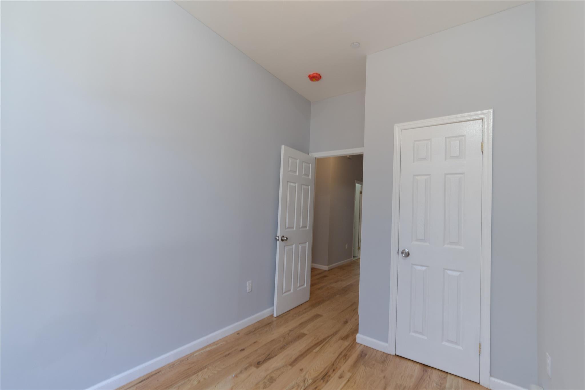 1102 Jackson Avenue Bronx, NY 10456 - Photo 9 of 36 a view of an empty room