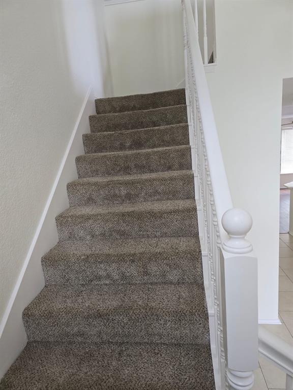 4325 Ridge Point Lane Plano, TX 75024 - Photo 11 of 11 Staircase featuring tile patterned flooring