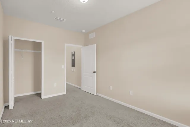 a view of a wooden fence