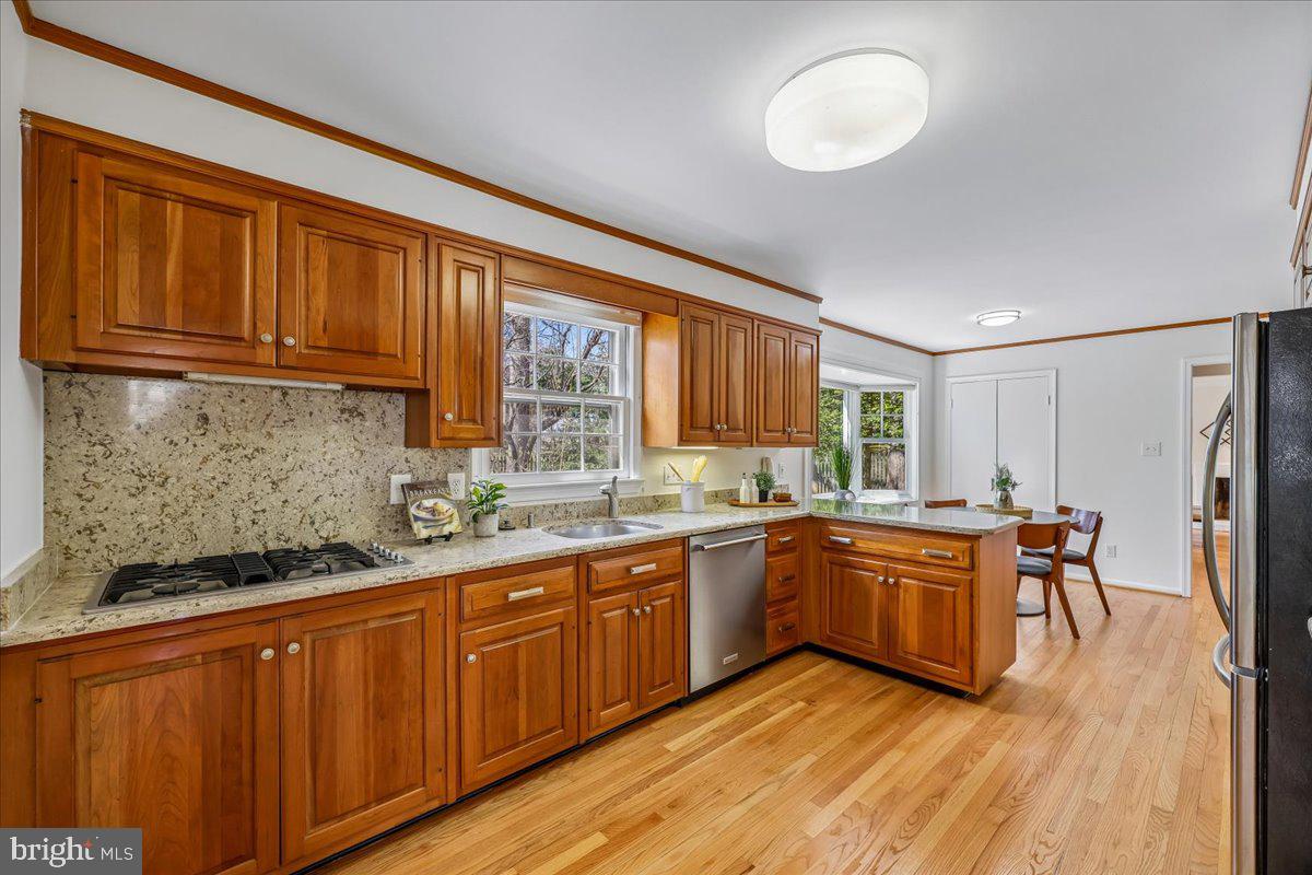 15012 Redgate Drive Silver Spring, MD 20905 - Photo 11 of 53 Kitchen Flows into the Breakfast Room