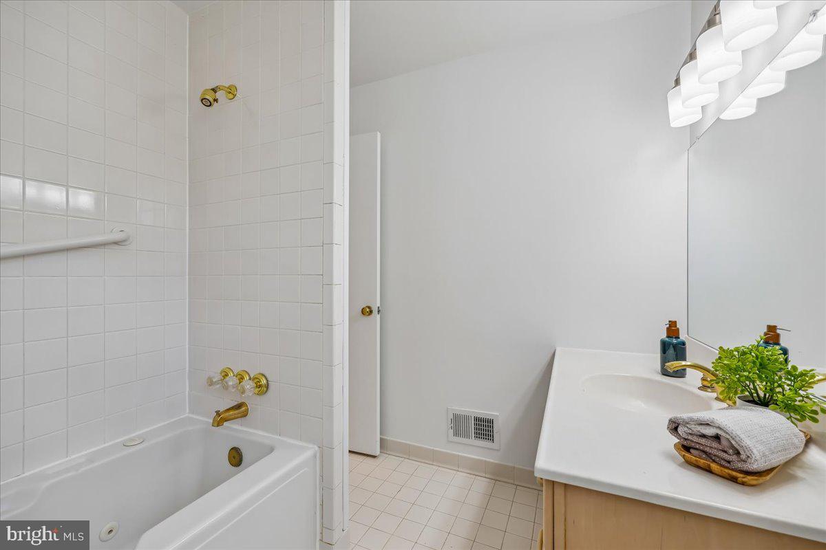 15012 Redgate Drive Silver Spring, MD 20905 - Photo 31 of 53 Recreation Room with a Tub / Shower Combination