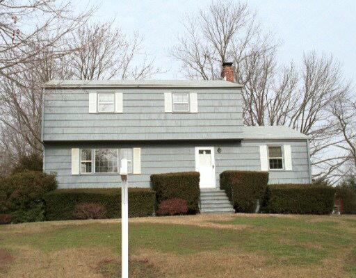 67 Magnolia Road Trumbull, CT 06611 - Photo 1 of 1 a front view of house with yard